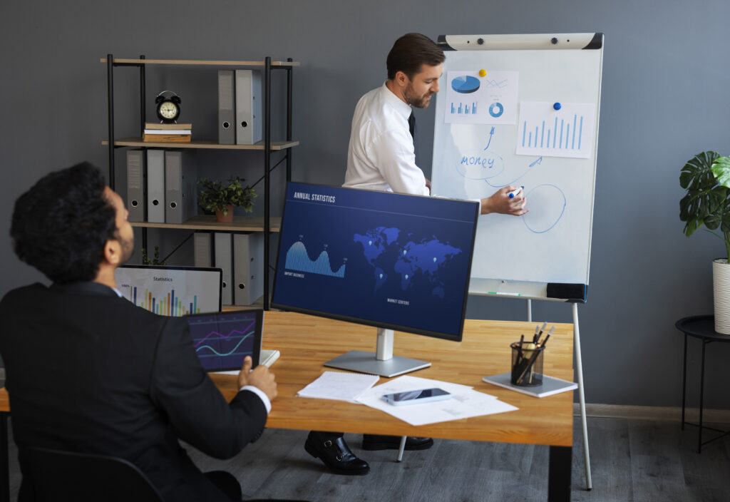 Data Analytics in 2025: Driving Smarter Business Decisions 2 business person looking finance graphs